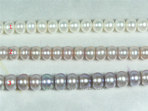 stunninng strands of 7-8mm natural white button freshwater pearl