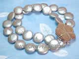 two rows 12mm gray coin freshwater pearl bracelet with  a delicate flower shell clasp