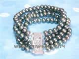 four rows 7-8mm black potato freshwater pearl bracelet  with a silver plated flower carved box clasp