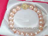 10-11mm pink potato freshwater pearl bracelet with  a zircon inlaid gold plated ball clasp