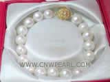 9-10mm white potato freshwater pearl bracelet with  a zircon inlaid gold plated ball clasp