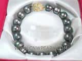 10-11mm black  potato freshwater pearl bracelet with  a zircon inlaid gold plated ball clasp