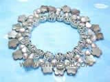5-6mm purple nugget freshwater pearl bracelet  with coffee flower shape shell beads