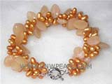 three rows 6mm gold potato freshwater pearl twisted bracelet  with orange crystal