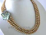 three rows 8-9mm light yellow potato freshwater pearl neacklace with a flower shape clasp