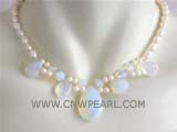 beautiful 7mm white rice and round freshwater pearl necklace with a teardrop opal pendant