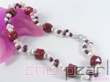 6-7mm dark blue and white top-drill freshwater pearl necklace with red faceted coral beads