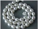 9mm white rice freshwater pearl necklace with a 925 sterling silver flower clasp