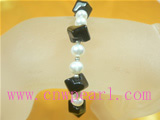 5-6mm freshwater pearl bracelet with black beads