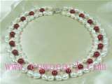 handmade knotted red coral and white pearl necklace