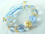 Adjustable knitted bracelet in 12mm cerulean crystal beads