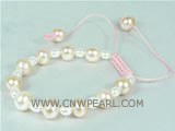 adjustable knitted bracelet with two different freshwater pearls