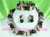 white rice shaped pearl necklace set with stone beads