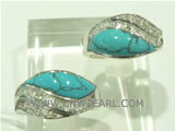 Chinese single crossipes shape turquoise ring in 925 silver